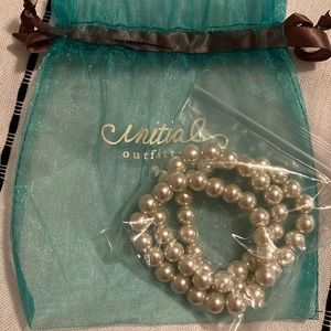 Three pearl bracelets